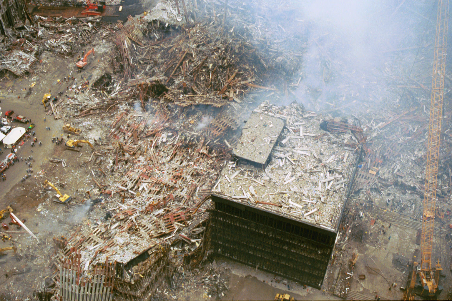 WTC 3 showing vertical bisection and progressive structural subtraction, demonstrating the vanishing core anomaly